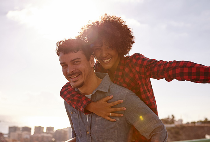 Couple enjoying the sunshine, man wanting to be a better partner