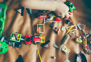 Changing face of fatherhood - kids toys strewn across a bedroom floor