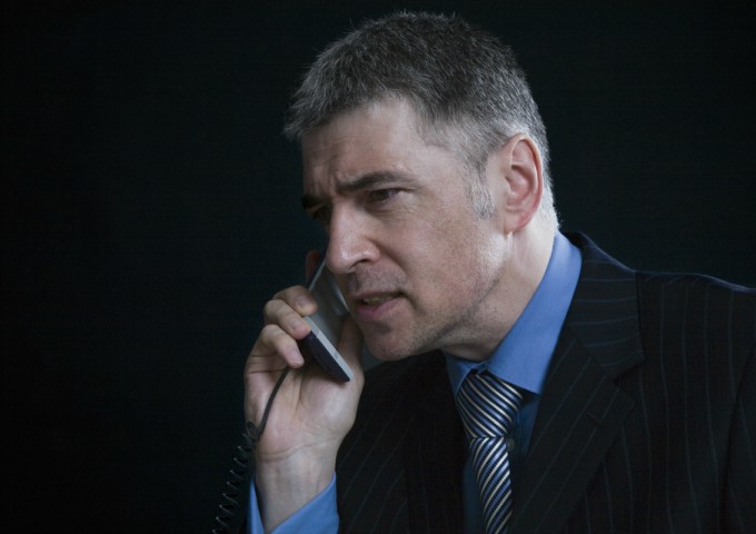 What is high functioning anxiety? Businessman on phone
