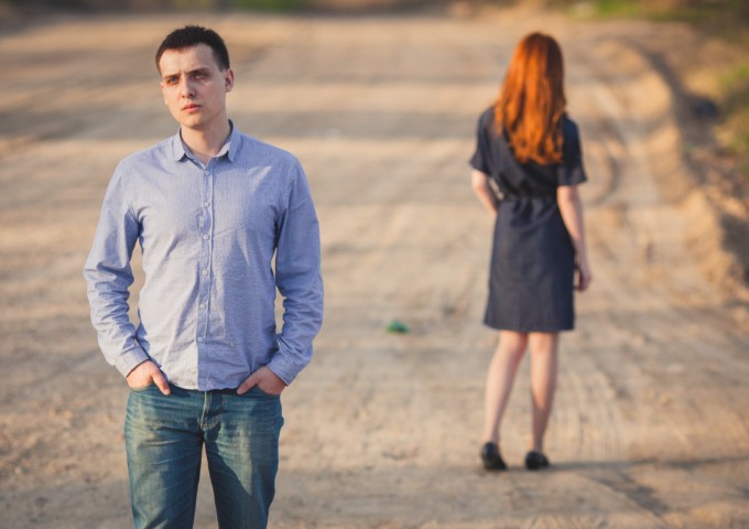 Man and woman facing different directions - relationship separation