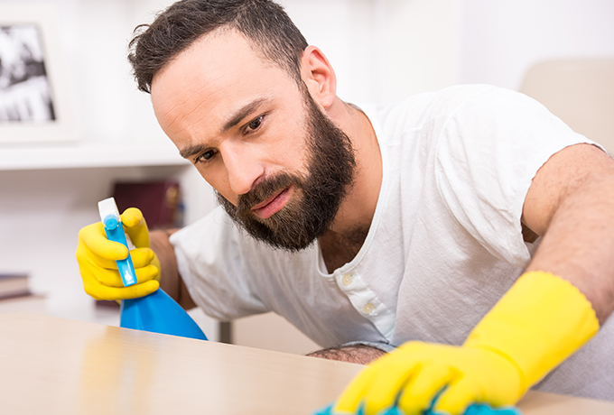 Man with OCD cleaning