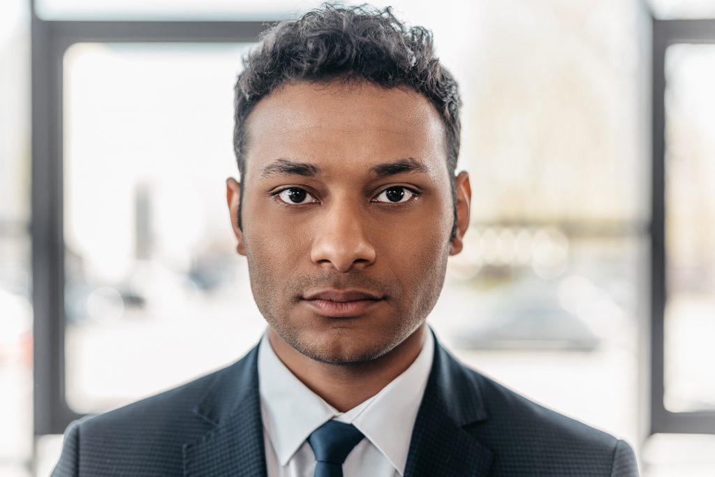 Man in a suit looking at camera