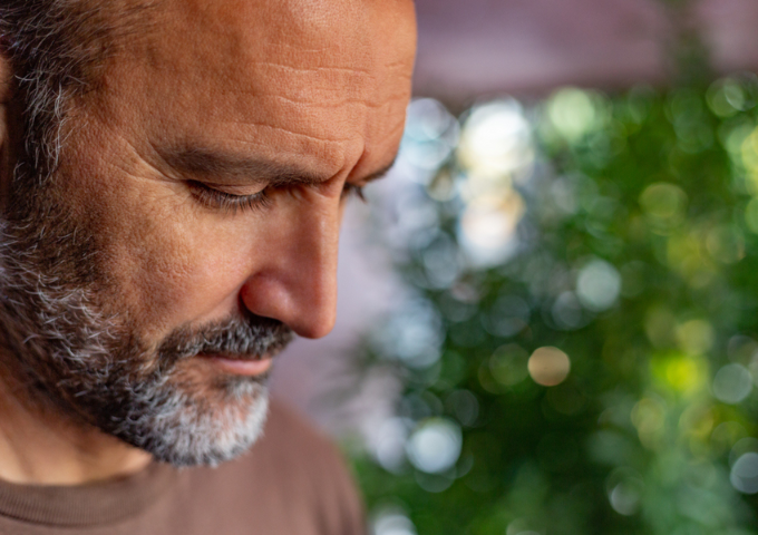 Close up portrait of man looking pensive