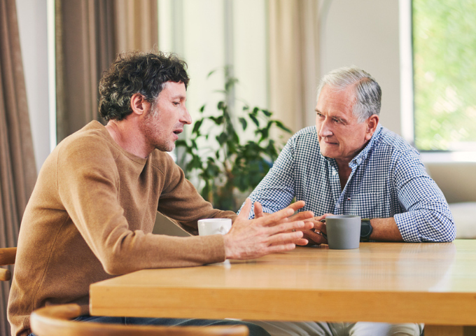 Two men in discussion
